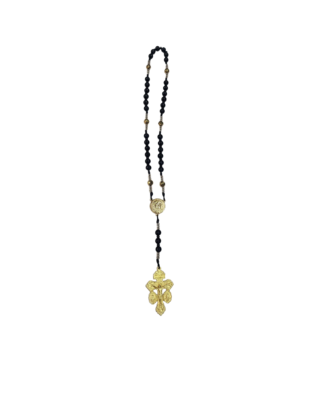 A gold and black beaded necklace with ornate gold medallions and a decorative gold pendant at the end, set against a plain white background.