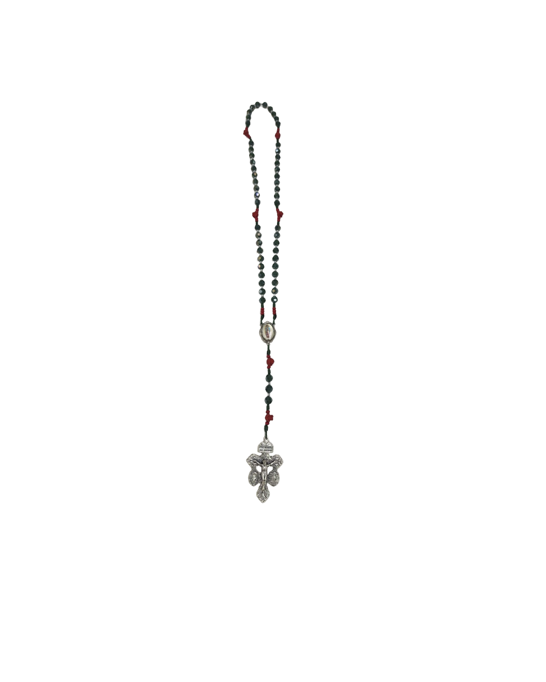 A long rosary with dark beads and red accents features an oval medallion and an ornate silver cross pendant at the end, against a white background.